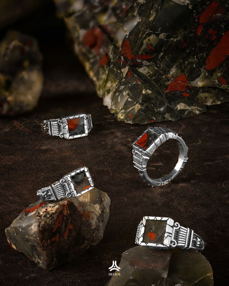 What are some popular gemstones in men's silver rings?