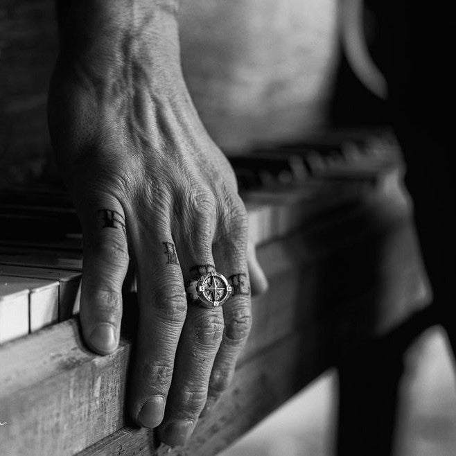 What Does a Ring on the Middle Finger Mean for a Man?