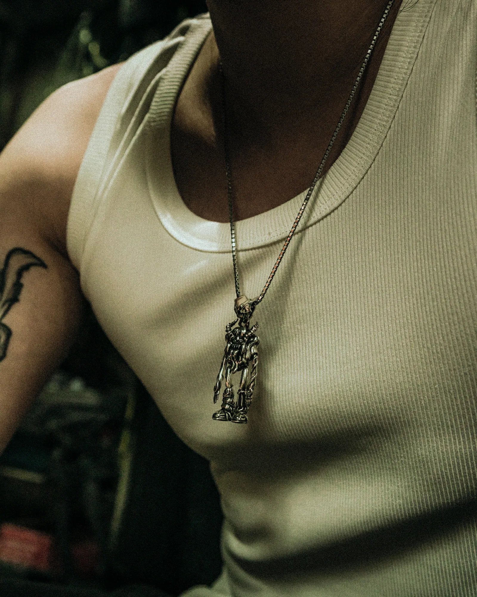 Model wearing the Spider Jack pendant